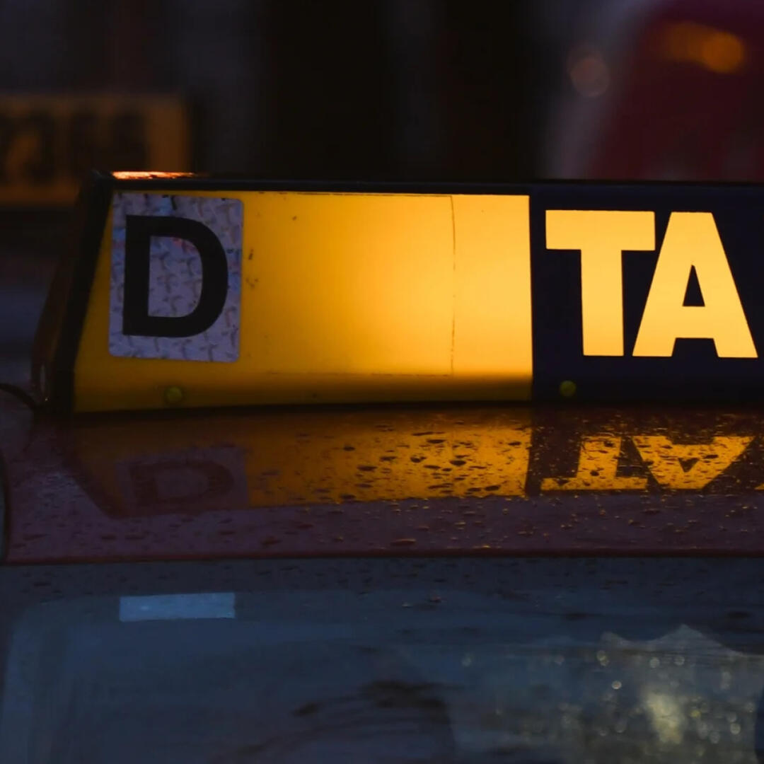Taxi Roof Sign at Night